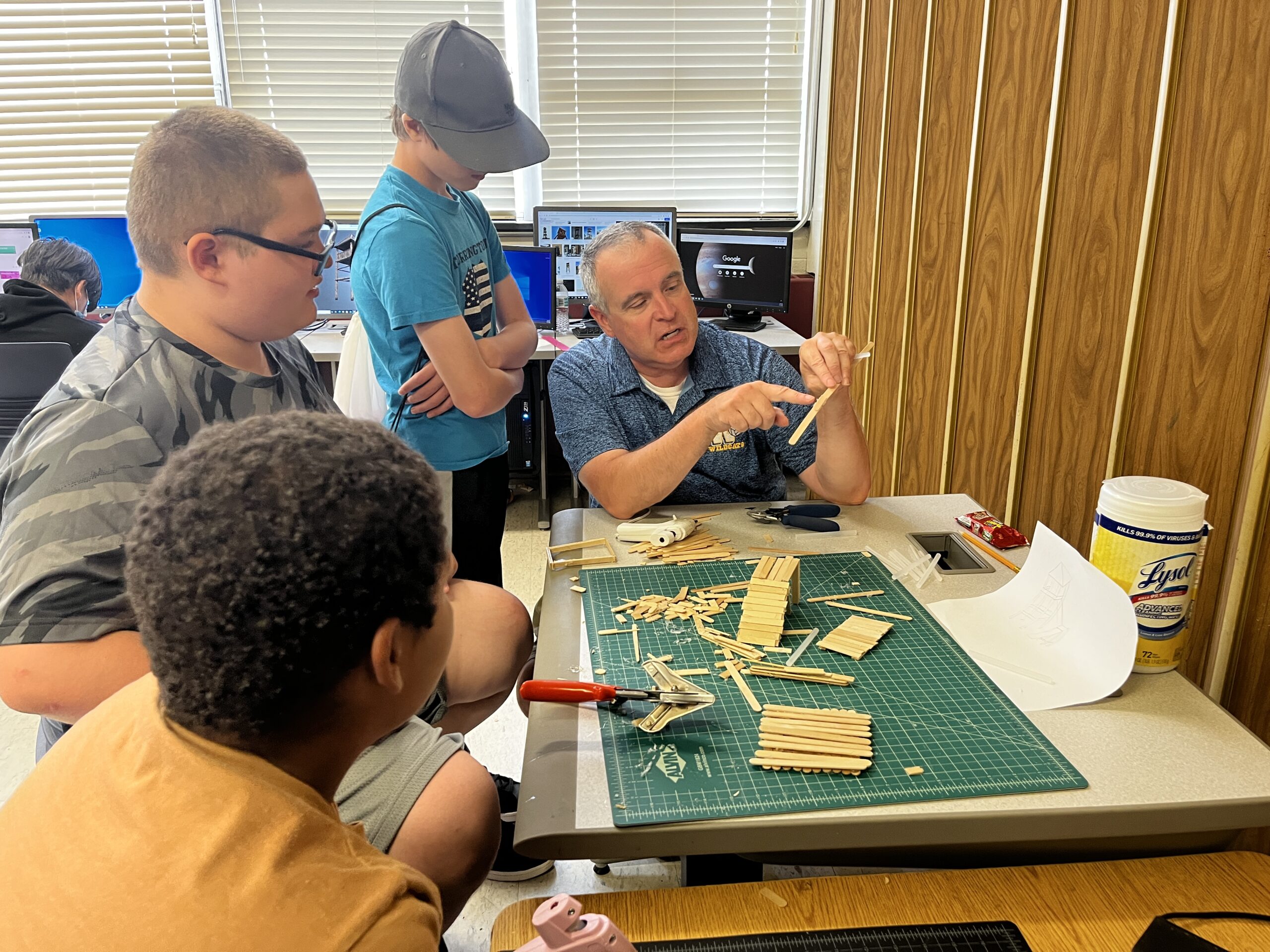 MDET Department Head Ray Tanguay assisting PAL Program students in their build.