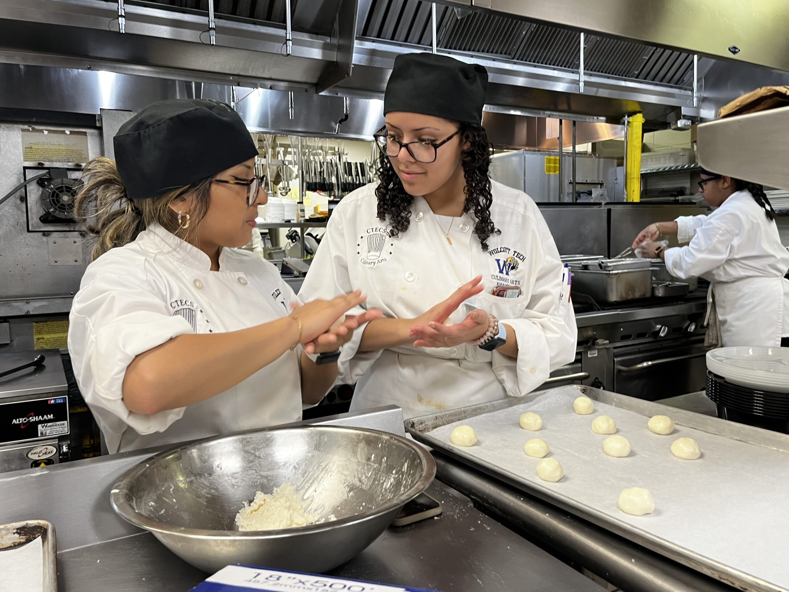 Image of Oliver Wolcott Technical High School Culinary Students preparing Hispanic Heritage Month menu items